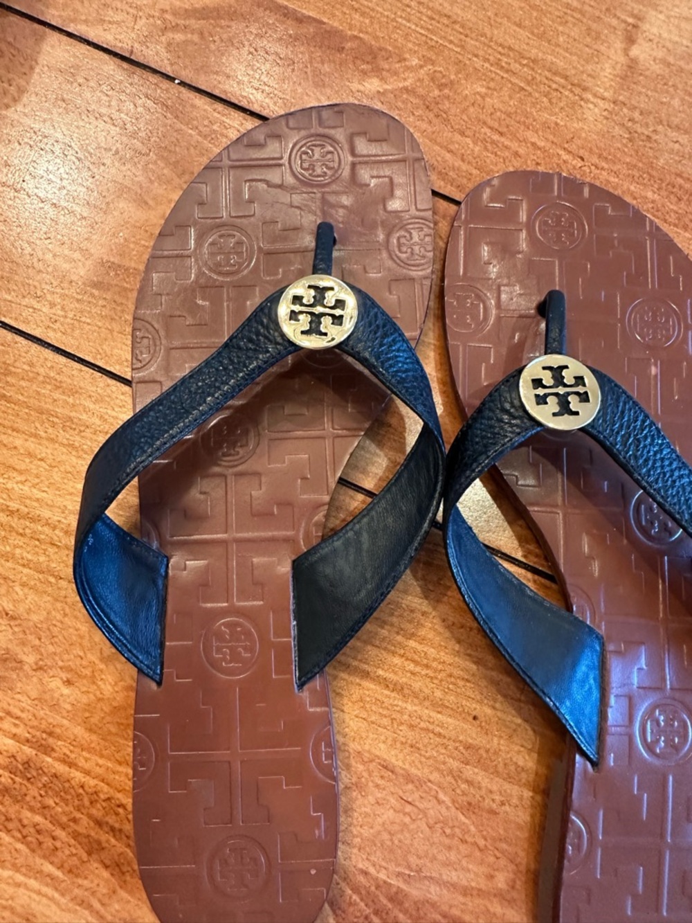 Tory Burch Black Leather Flip Flops with Gold Logo Discs size 9